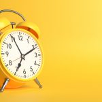 Yellow,Vintage,Alarm,Clock,On,Bright,Yellow,Background,In,Pastel